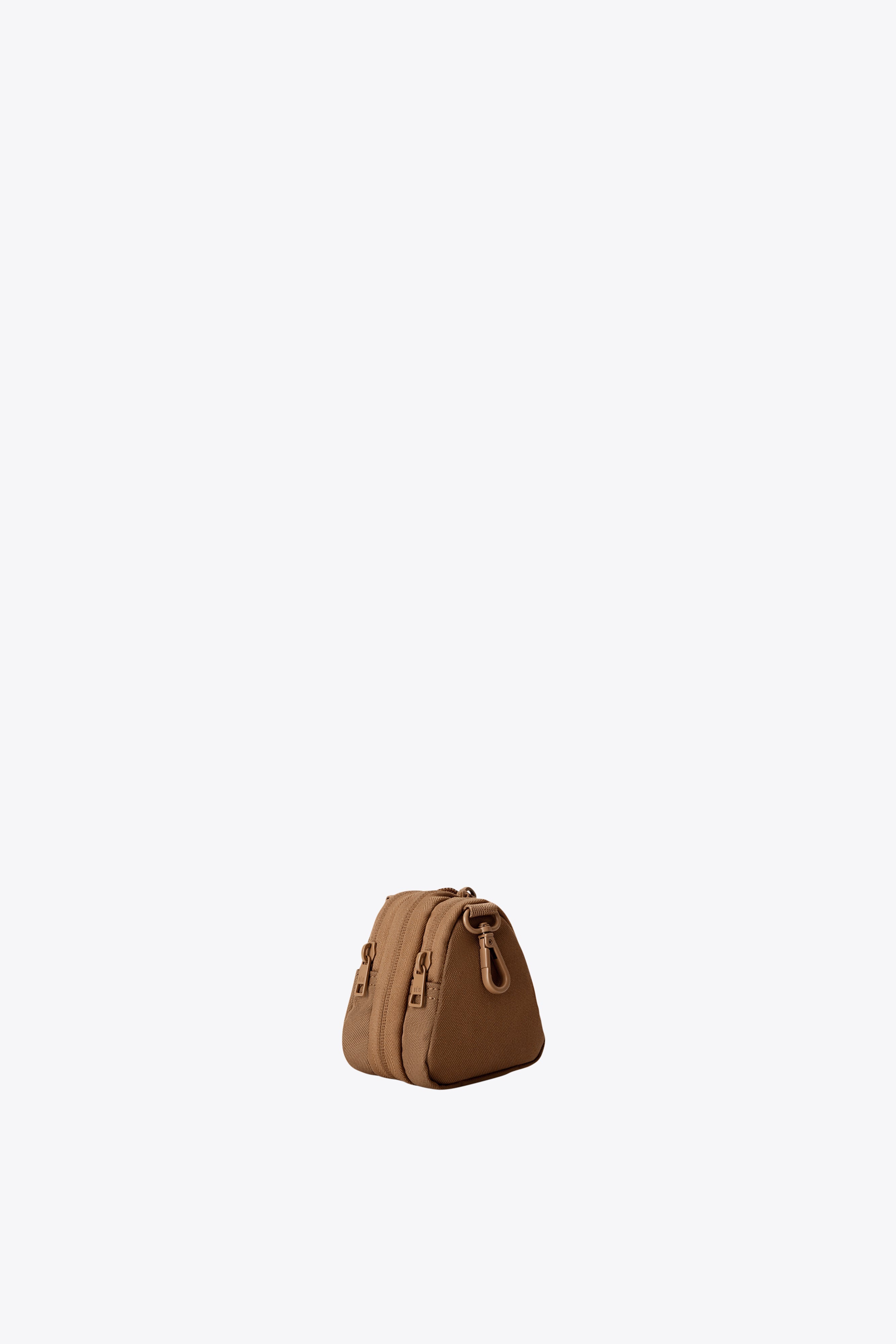 The Expandable Crossbody Charm in Camel