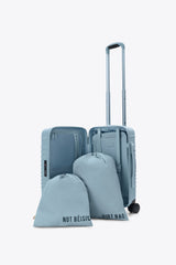 The Small Carry-On Roller in Denim Blue