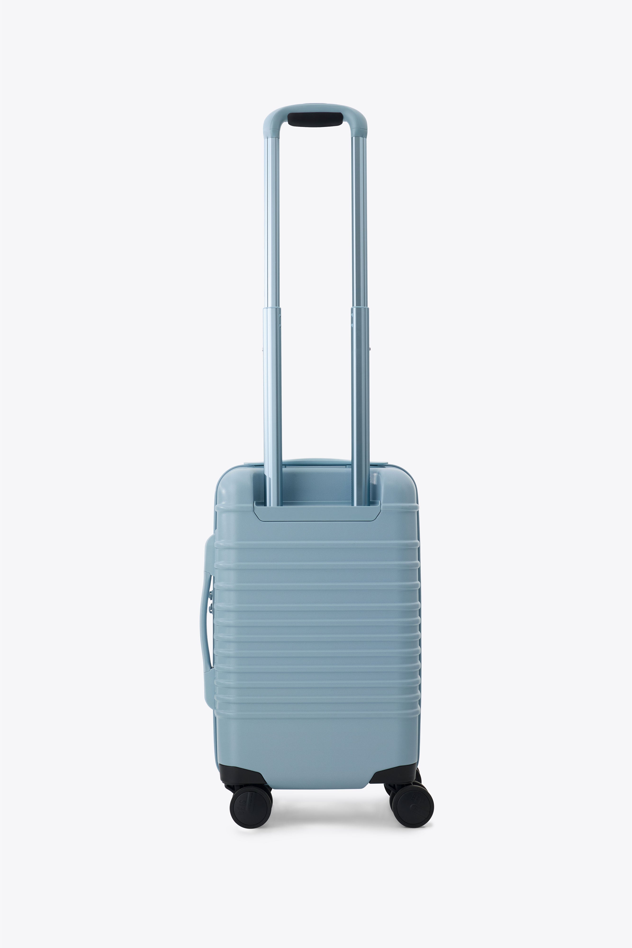 The Small Carry-On Roller in Denim Blue